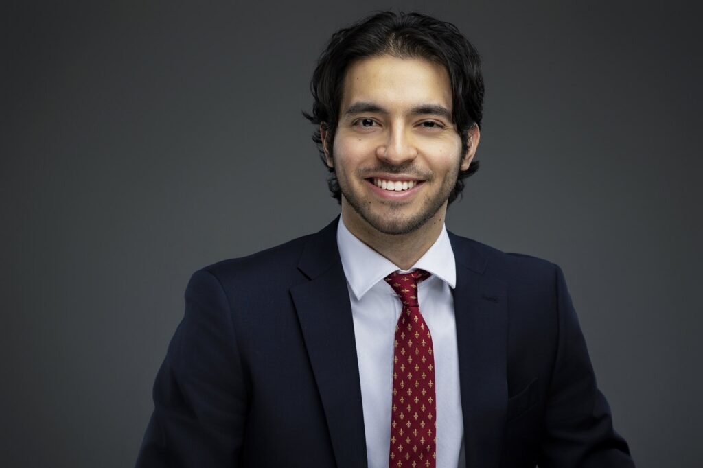 Corporate headshot in Edmonton studio with clean professional backdrop